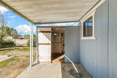 Move-in ready, recently remodeled factory-built home on owned