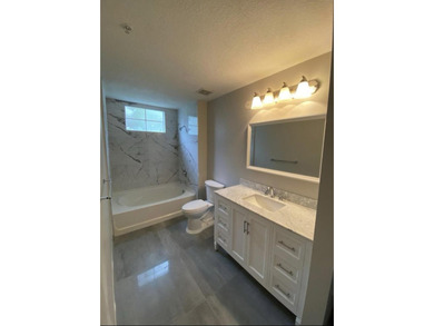 Simply Stunning!! Sought after and rarely available 3 bed 2 bath - photo 10