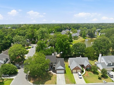 Perfectly positioned on a beautiful corner lot in the highly - photo 35