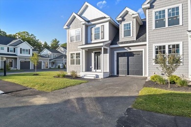 Like-new luxury 2-bedroom, 2.5-bath end-unit townhome in an - photo 4