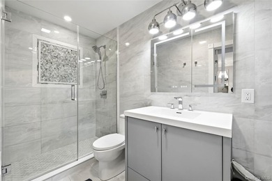Beach living at its BEST! Completely remodeled in 2023, this - photo 12