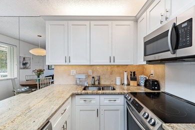 Tropical in feel, this elegant apartment is part of Jupiter Bay - photo 12