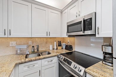 Tropical in feel, this elegant apartment is part of Jupiter Bay - photo 13