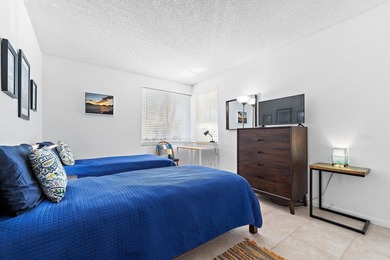 Tropical in feel, this elegant apartment is part of Jupiter Bay - photo 16
