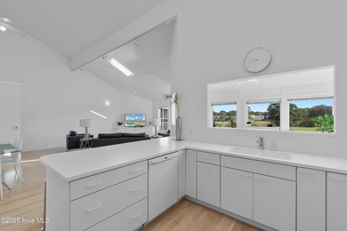 This townhome offers a spectacular water and golf view and is - photo 22