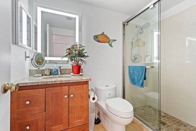 Tropical in feel, this elegant apartment is part of Jupiter Bay - photo 25