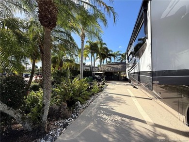 Located on the large lake with double fountains, this is truly - photo 4