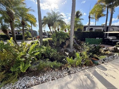 Located on the large lake with double fountains, this is truly - photo 5