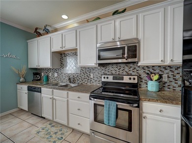 Stunning Canal Townhome just Moments from the Beach! Situated on - photo 8