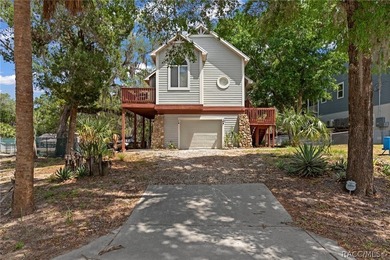 Enjoy the best of Florida waterfront living in this elevated - photo 1