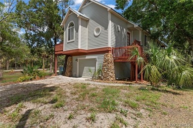 Enjoy the best of Florida waterfront living in this elevated - photo 2