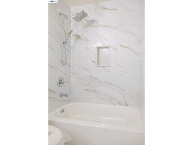 This beautifully and fully remodeled duet-style home, built in - photo 22