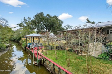 Welcome to your waterfront retreat in Bay Saint Louis! Although