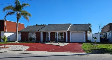 Lake Home For Sale in Holiday, Florida