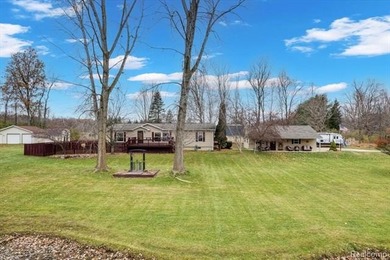 Lake Home For Sale in Arcadia, Michigan