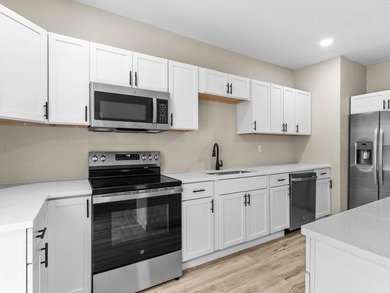 This beautifully renovated 5-bedroom, 2-bath home has been - photo 11