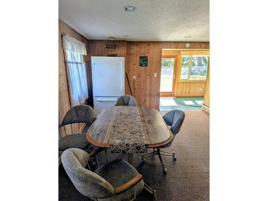 Enjoy 62 feet of shoreline on beautiful Pokegama Lake located - photo 12
