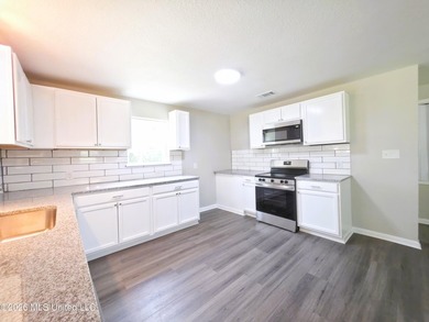 Welcome Home to this 3 bedrooms 2 baths newly renovated home in - photo 9