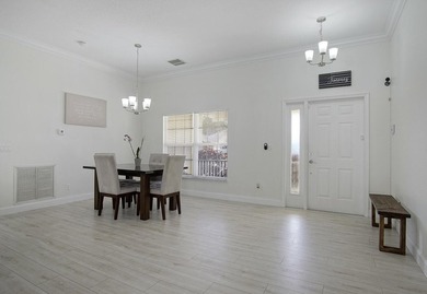 This stunning pool home has it all! Gorgeous plank tile flooring - photo 11