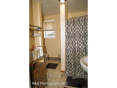 This 6 bedroom, 3-bathroom home features a cozy wood-burning - photo 14