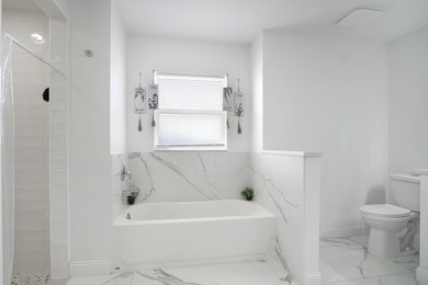 This stunning pool home has it all! Gorgeous plank tile flooring - photo 15