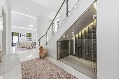 Built in 2020, this chic in-town home on the ocean block of