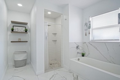 This stunning pool home has it all! Gorgeous plank tile flooring - photo 16