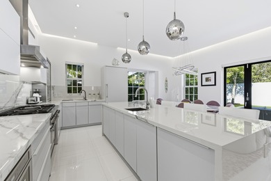 Built in 2020, this chic in-town home on the ocean block of