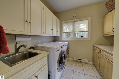 Set on the coveted south end of Big Glen Lake with 90 feet of - photo 29