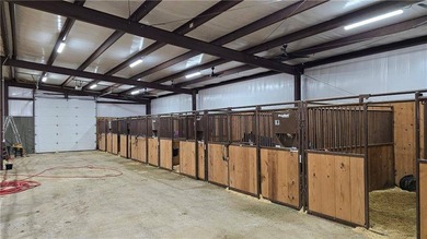 Exceptional equestrian property featuring a 49,466 SF enclosed - photo 6