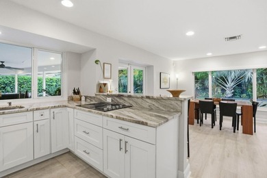 Tucked away within one of East West Palm Beach's most - photo 12
