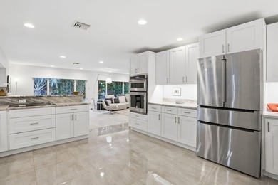 Tucked away within one of East West Palm Beach's most - photo 13