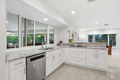 Tucked away within one of East West Palm Beach's most - photo 14
