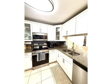 Welcome to this two-bedroom, two-bathroom condominium located in - photo 19