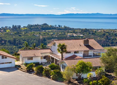 Close to downtown, this gated & private Carpinteria coastal - photo 1