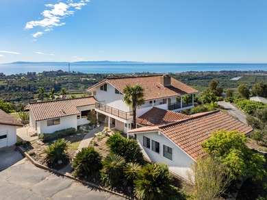 Close to downtown, this gated & private Carpinteria coastal - photo 3