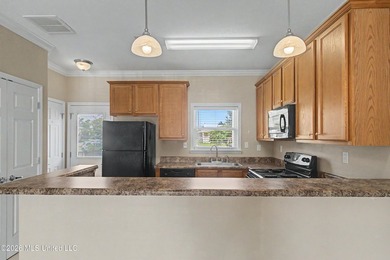 Welcome to Beau Clair Condominium, where coastal elegance meets - photo 8