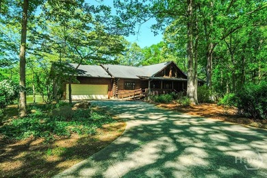 Tucked away on 4.12 private acres with approximately 350 feet of - photo 2