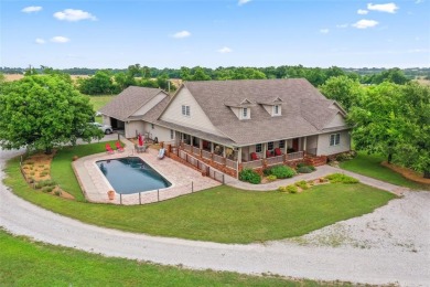 Nestled on approximately 72 acres, this stunning two-story ranch