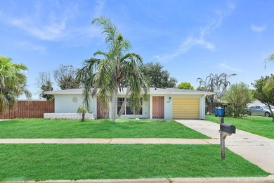 Mid-century modern charm abounds in this CBS home that features - photo 1