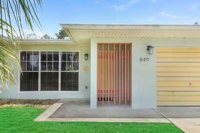 Mid-century modern charm abounds in this CBS home that features - photo 2