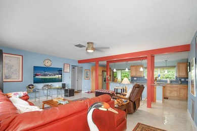 Mid-century modern charm abounds in this CBS home that features - photo 3