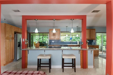 Mid-century modern charm abounds in this CBS home that features - photo 7