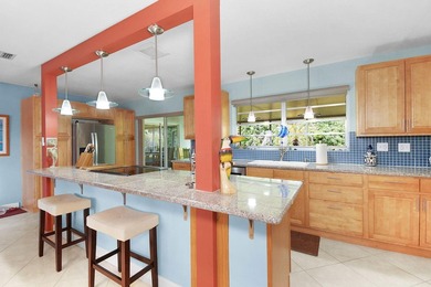 Mid-century modern charm abounds in this CBS home that features - photo 8