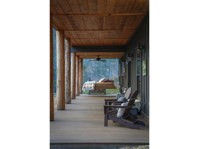 Set on 8.5 pristine acres, this extraordinary custom-built cabin