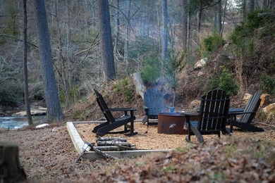 Set on 8.5 pristine acres, this extraordinary custom-built cabin