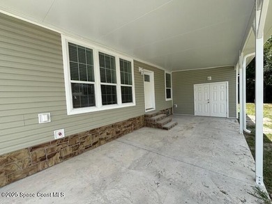 This brand-new 2025 manufactured home offers modern living in a - photo 26