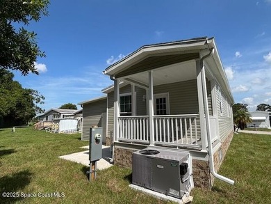 This brand-new 2025 manufactured home offers modern living in a - photo 30