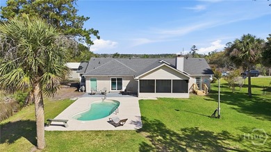 $20K Price Drop!! Tucked away on a quiet peninsula along the - photo 2