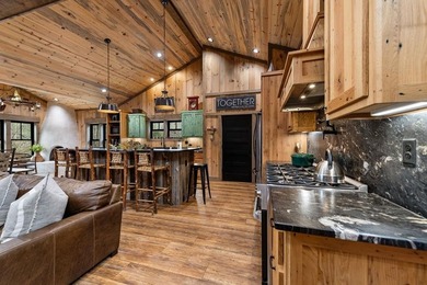 Set on 8.5 pristine acres, this extraordinary custom-built cabin - photo 33